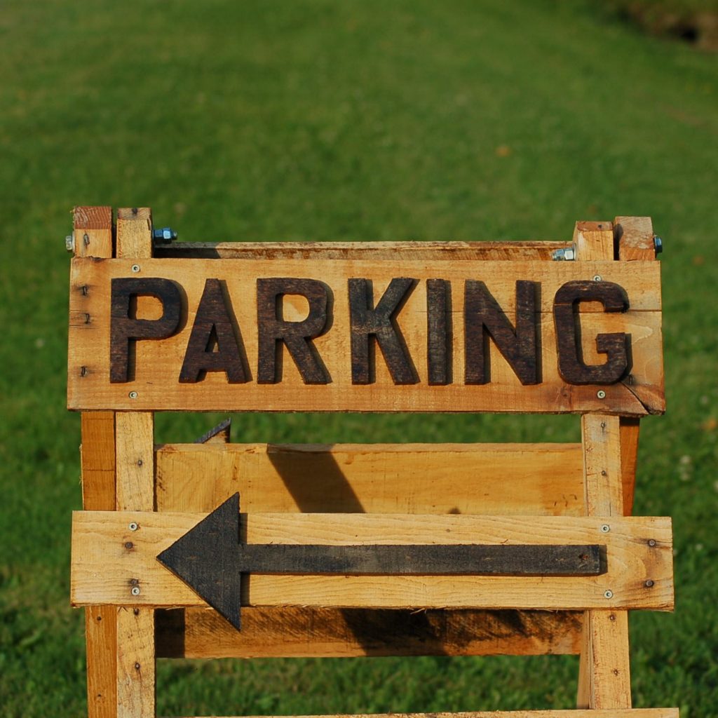 Photo showing parking sign.